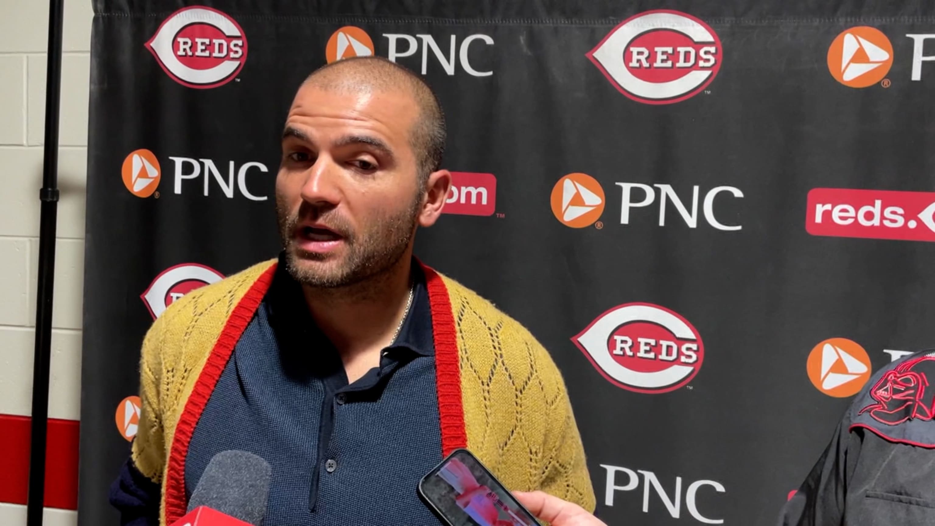 Votto signs ball for fan: 'I am sorry I didn't play the entire game