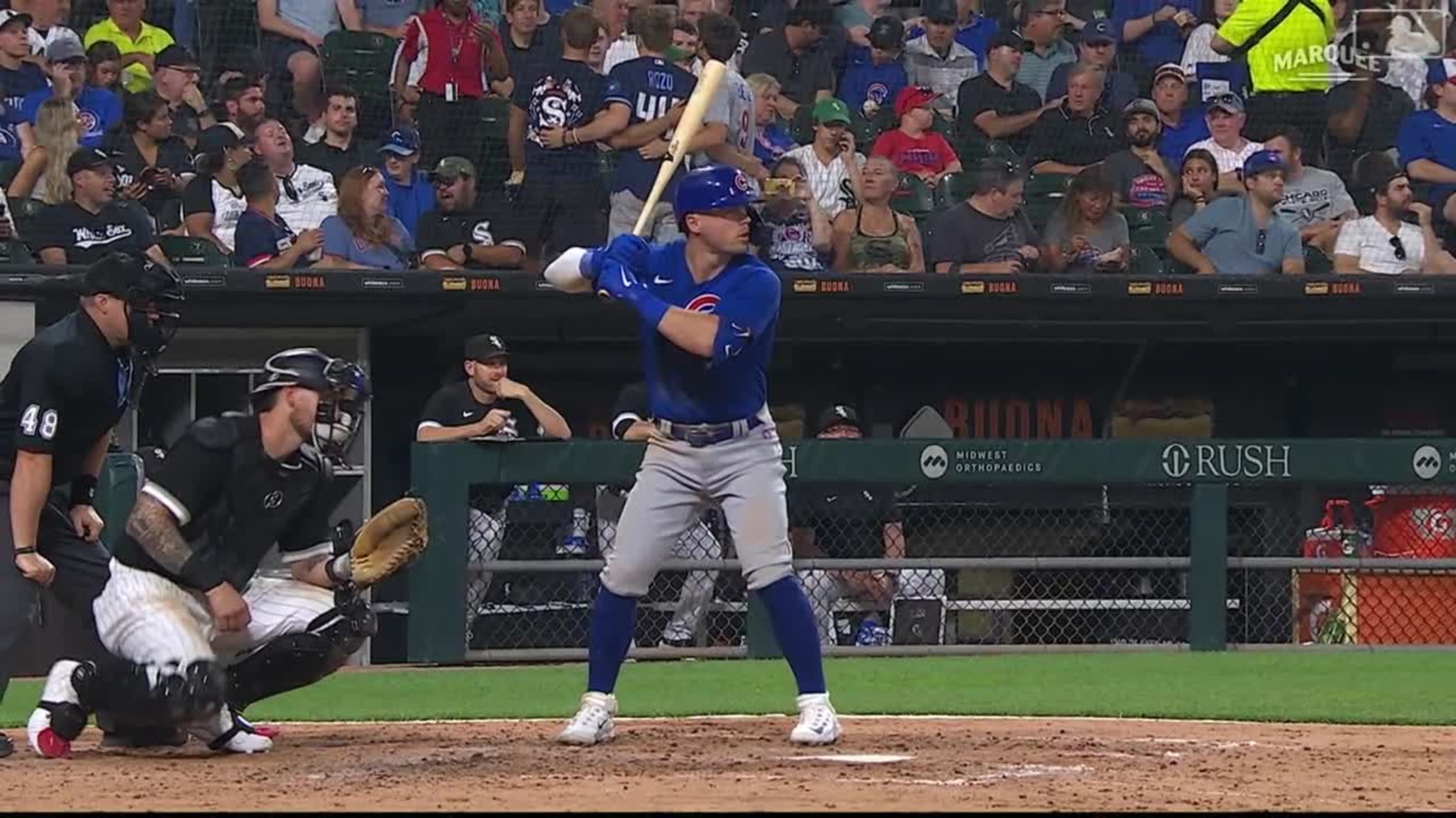 Seiya Suzuki of the Chicago Cubs hits a sacrifice fly in the first inning  of a baseball game against the Milwaukee Brewers on April 9, 2022, at  Wrigley Field in Chicago. (Kyodo)==Kyodo