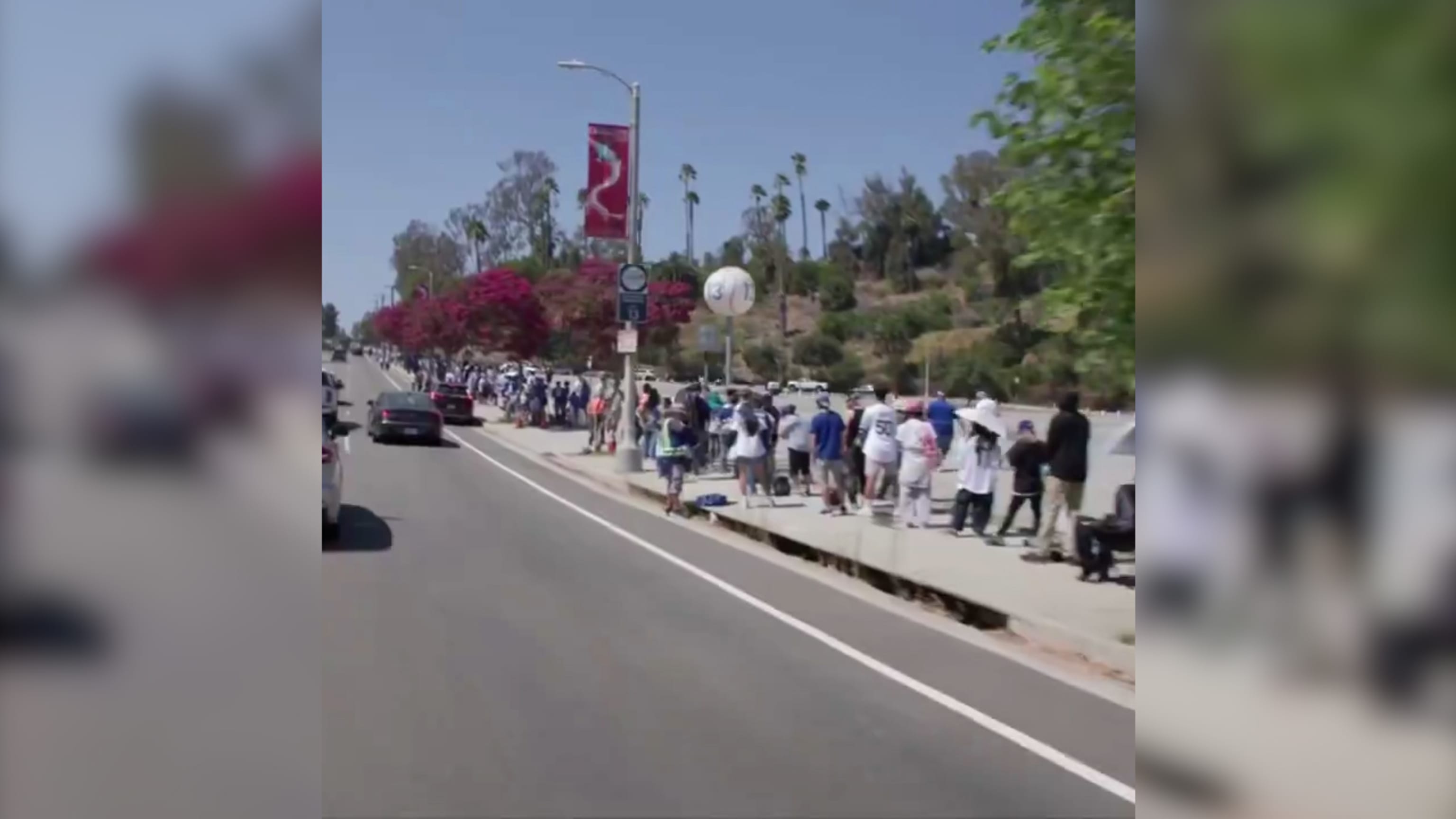 Dodgers fans wait in line for Ohtani bobbleheads