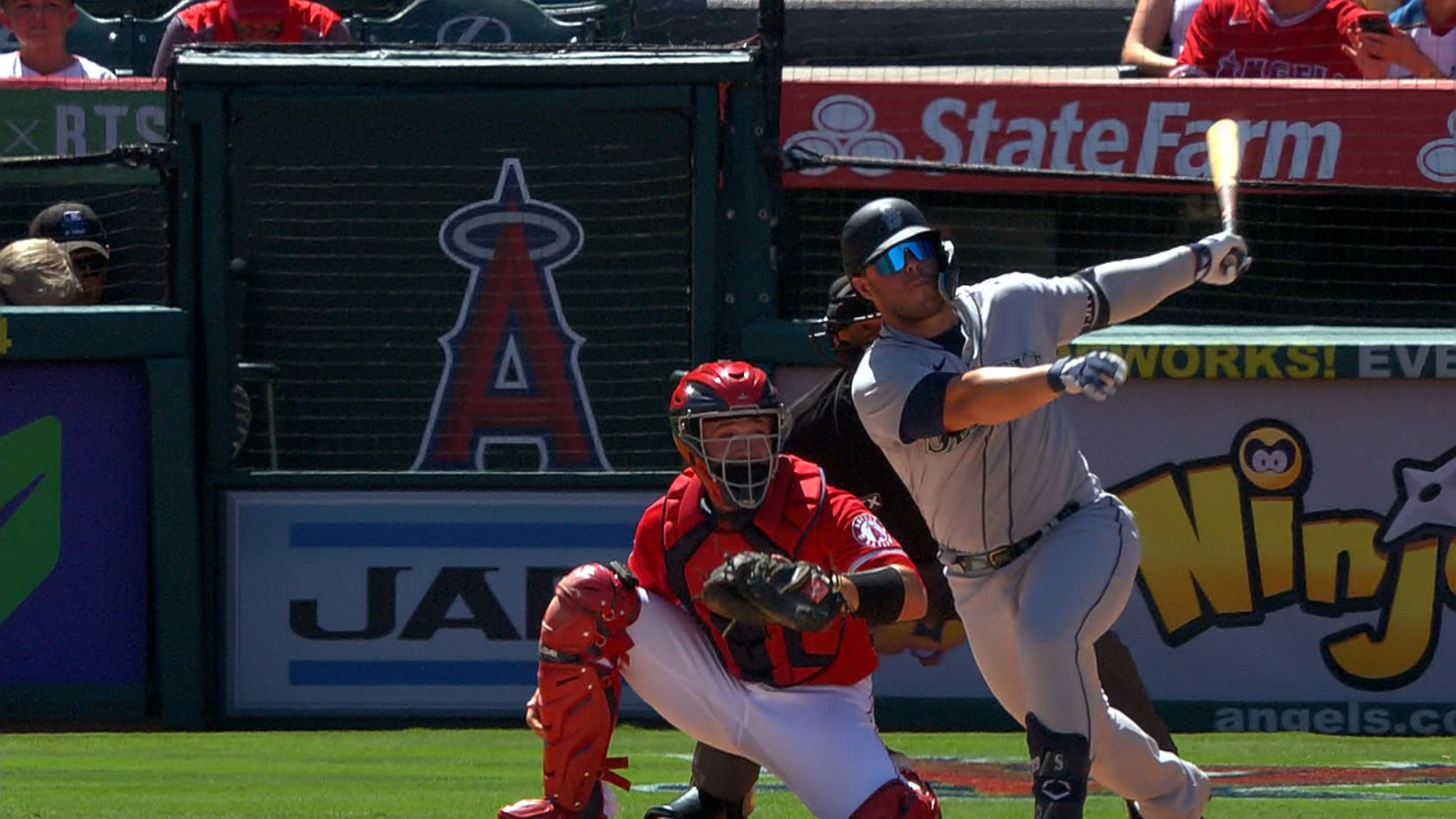 Santana homers twice, drives in 5; Mariners slam Angels 9-1