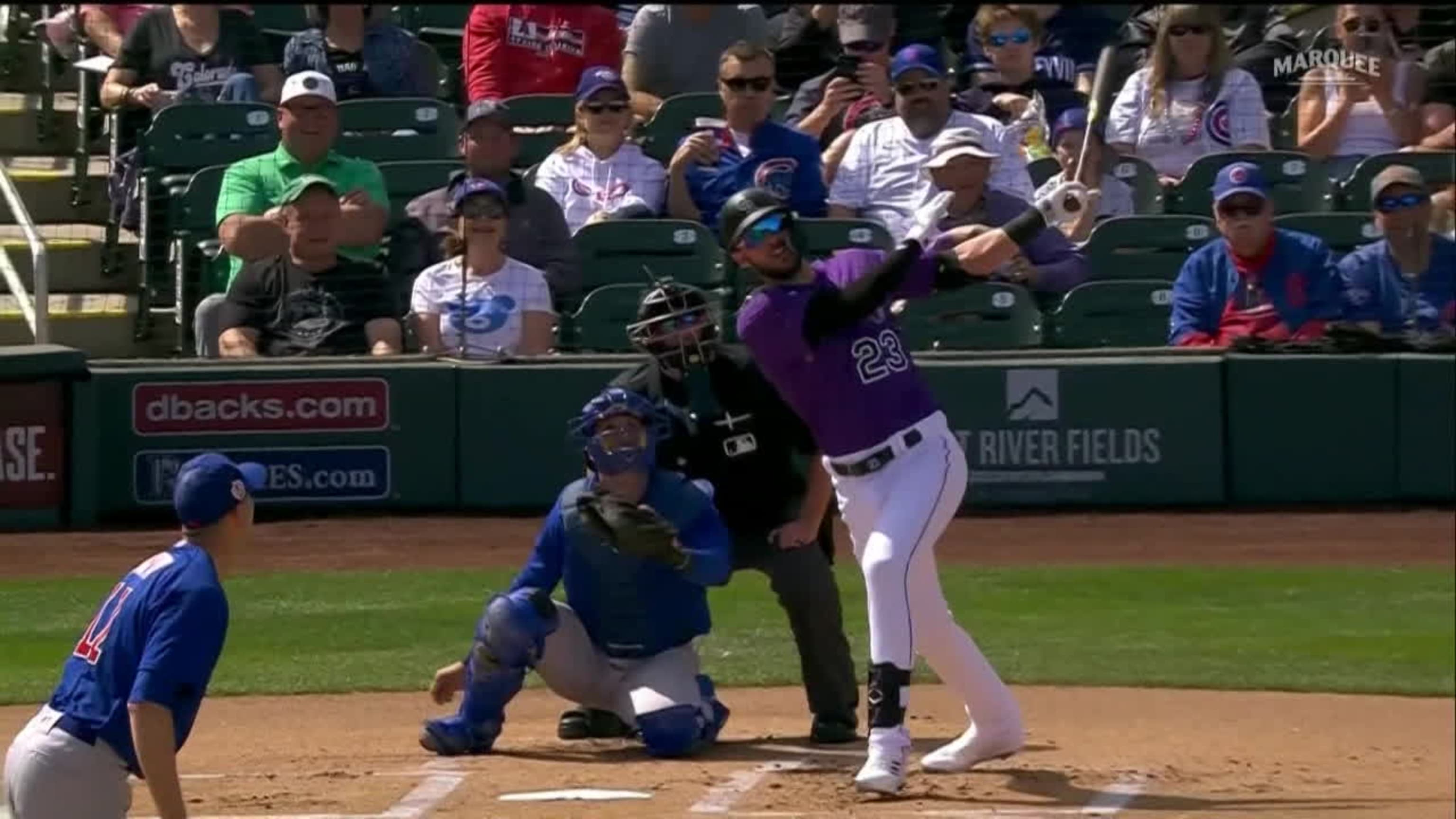 Colorado Rockies right fielder Kris Bryant prepares to bat in an