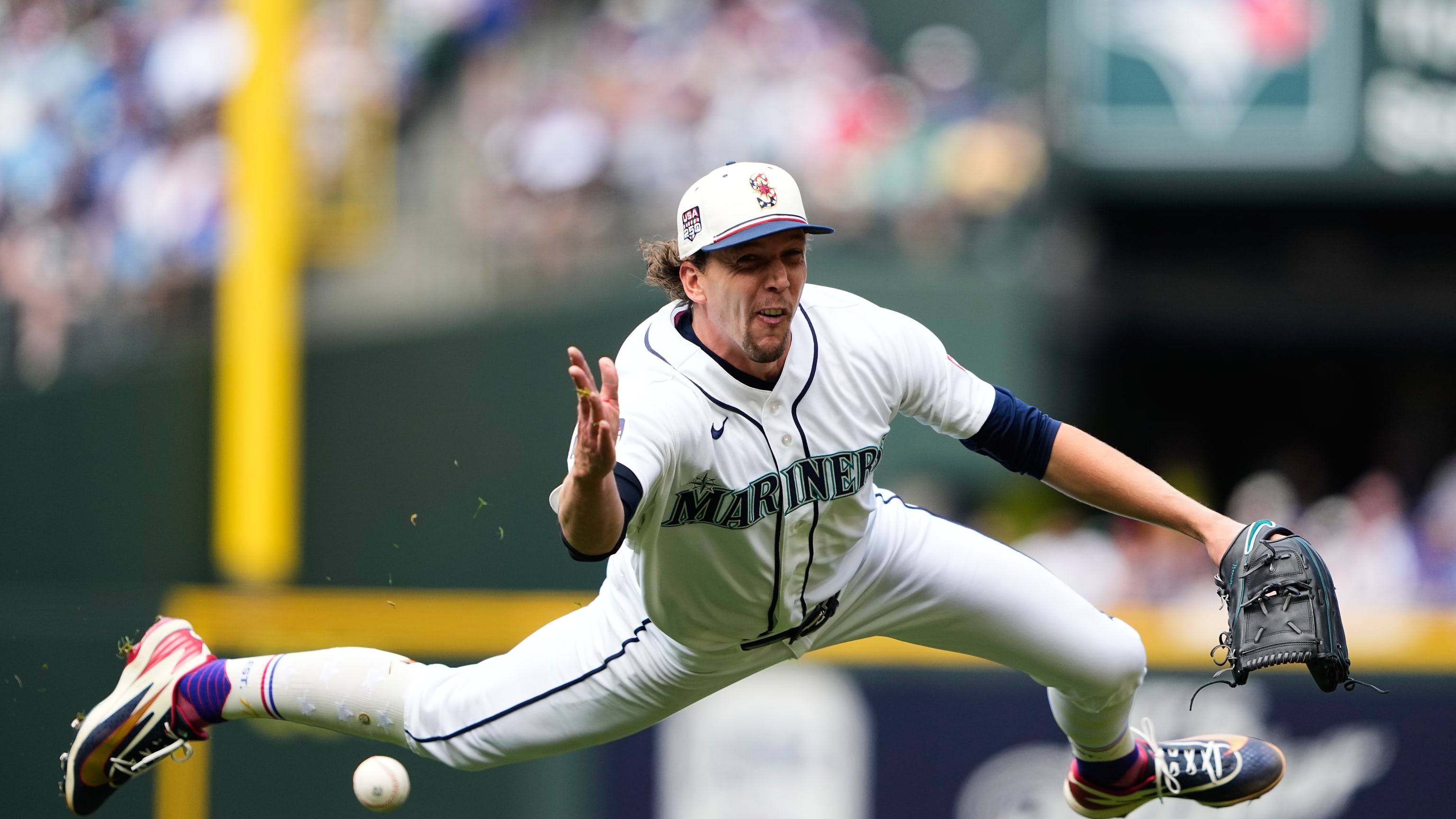 Logan Gilbert makes the great flip to first (Photo: MLB.com)