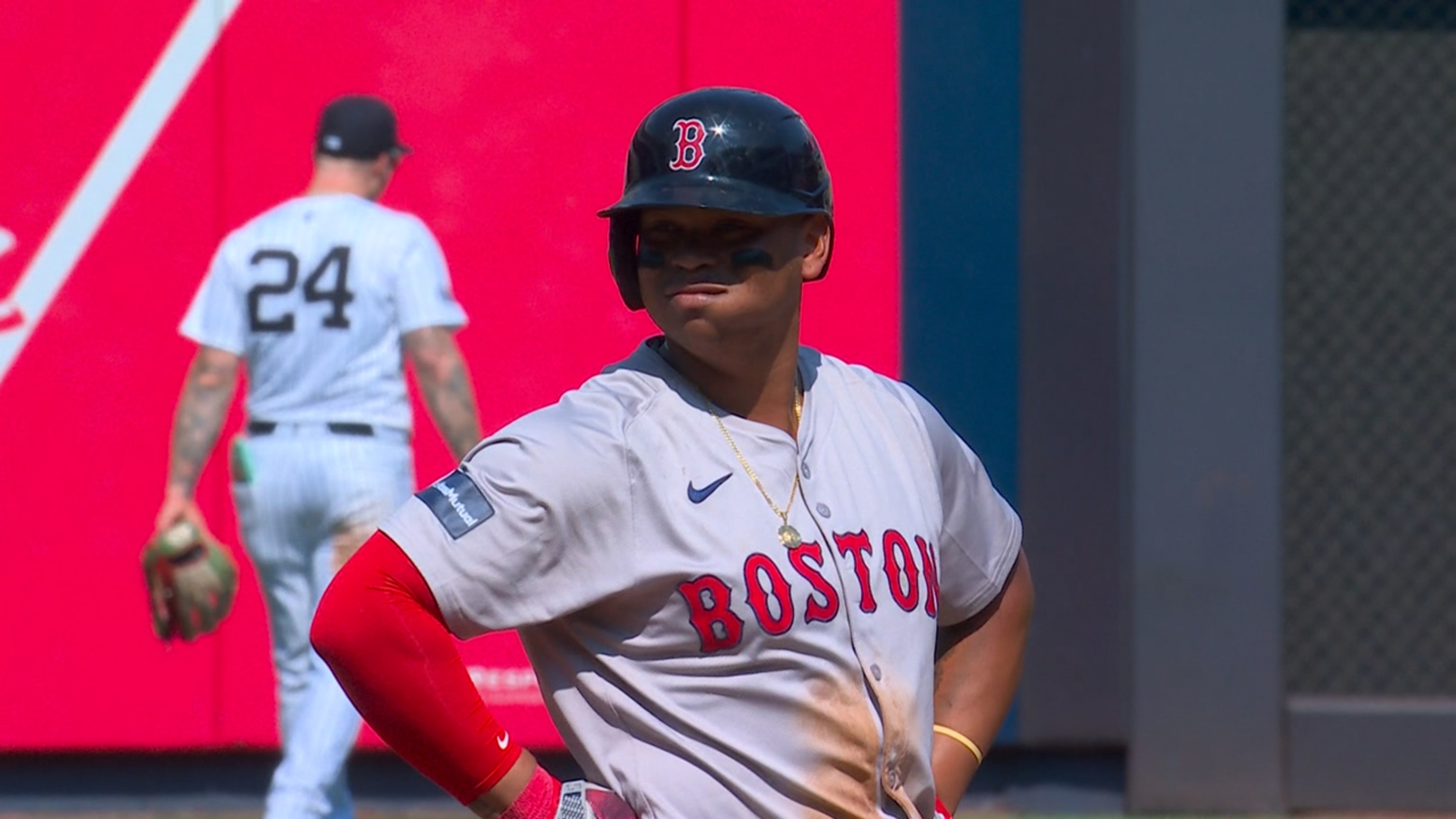 Rafael Devers scores after intentional walk