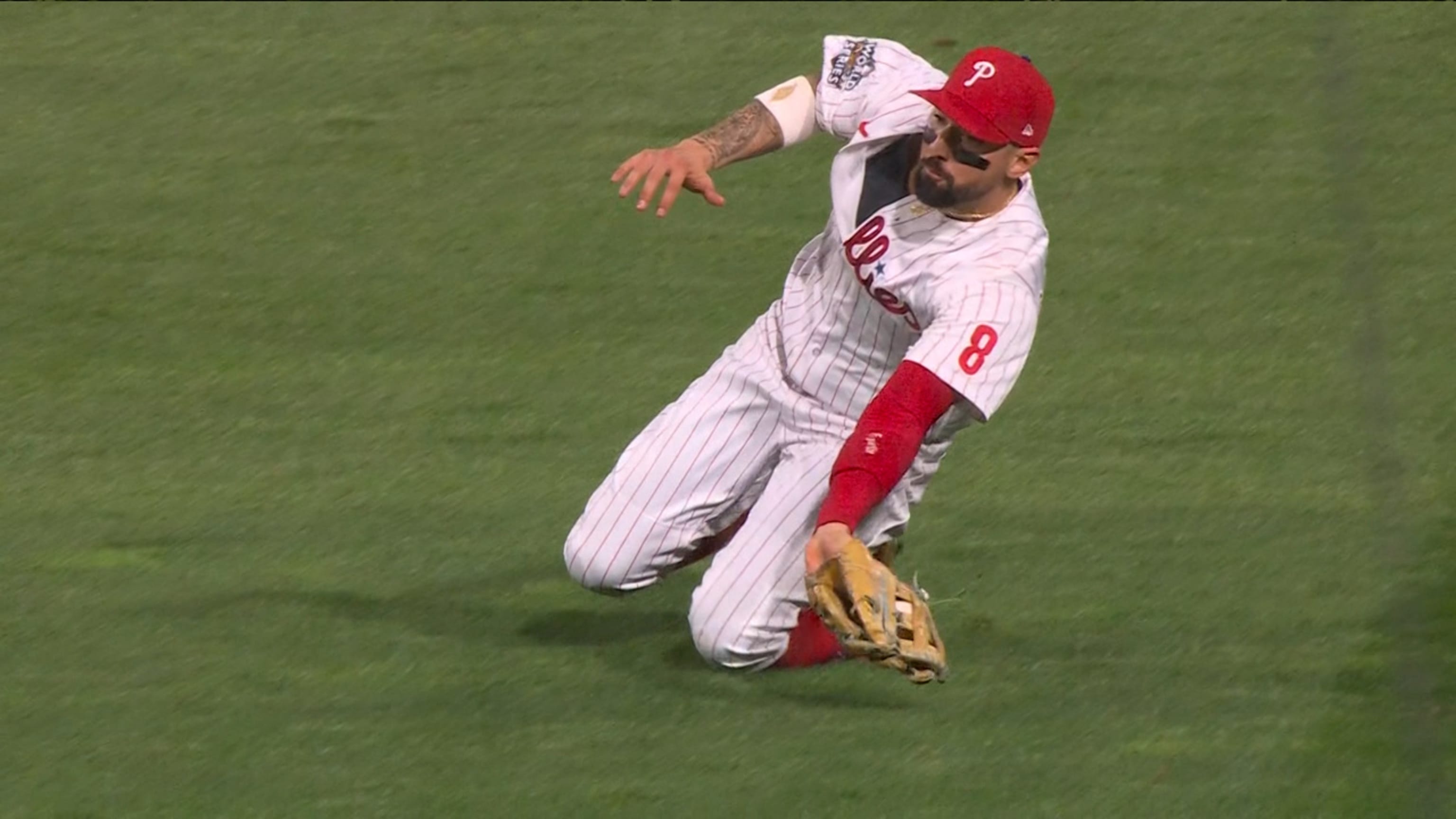 Philadelphia Phillies' Brandon Marsh takes off a batting glove