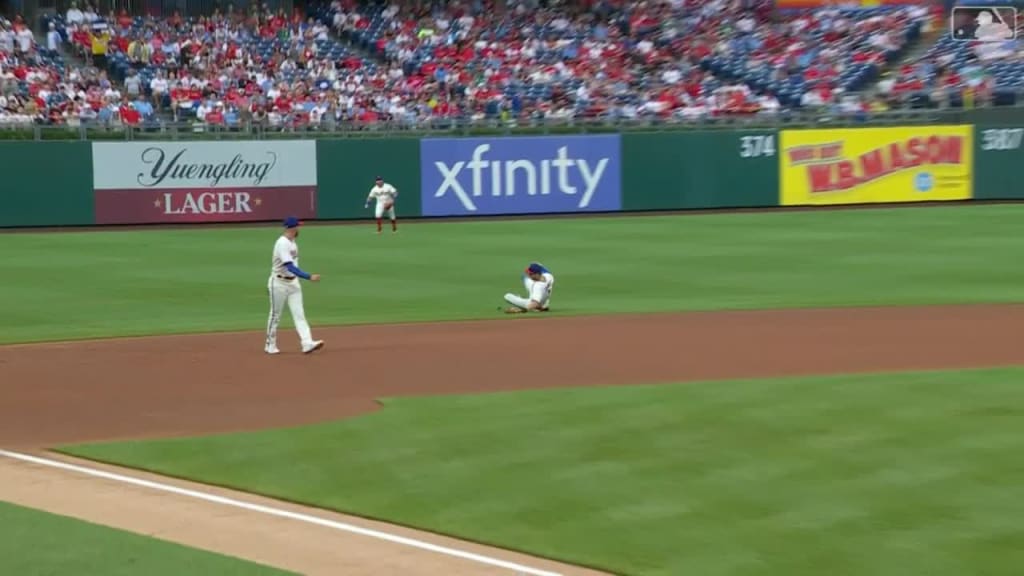 Washington Nationals shortstop Trea Turner slides into third on a