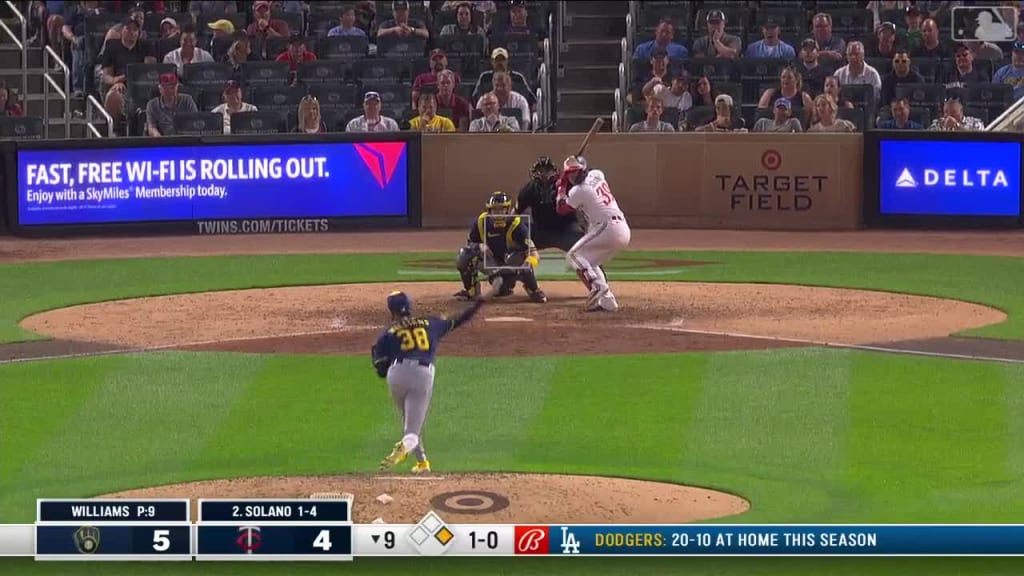 Willi Castro robs home run with card in other hand