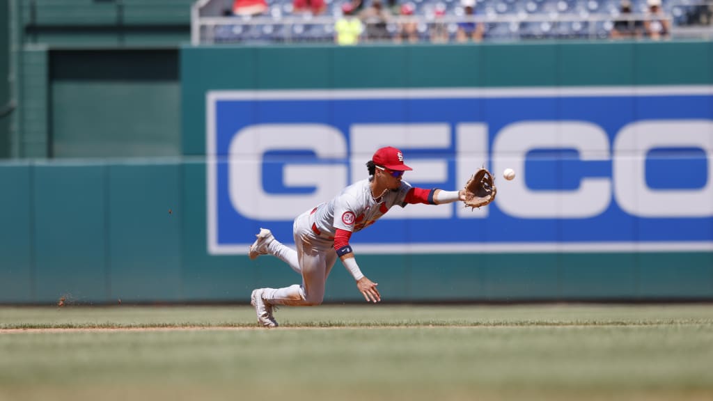 The Cardinals turn a sweet 6-4-3 double play