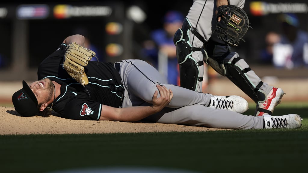 Kevin Ginkel exits after being hit by a comebacker