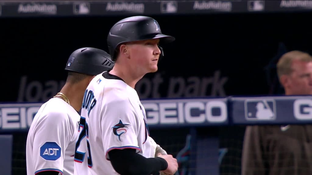 Garrett Cooper of the Miami Marlins singles during the third