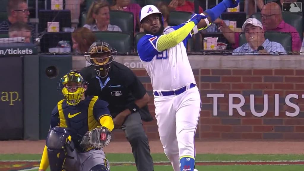 Hours before Marcell Ozuna's tape-measure homer, his wife went deep in a  softball game