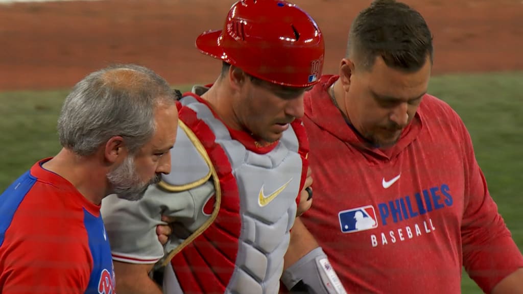J.T. Realmuto exits game with injury in the 9th