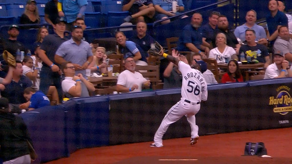 Tampa Bay Rays left fielder Randy Arozarena makes the catch on a