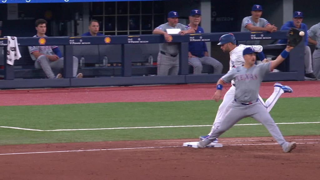 Kevin Kiermaier is safe at first after review 