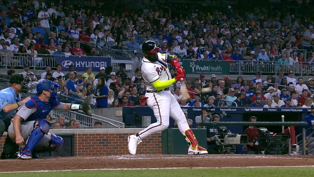 Hours before Marcell Ozuna's tape-measure homer, his wife went deep in a  softball game