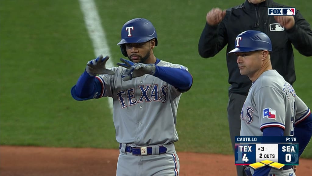 Texas Rangers center fielder Leody Taveras watches the pitch from