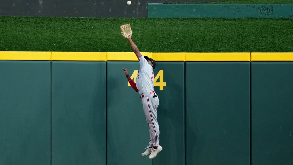 Willi Castro leaps at the wall and takes away a home run 