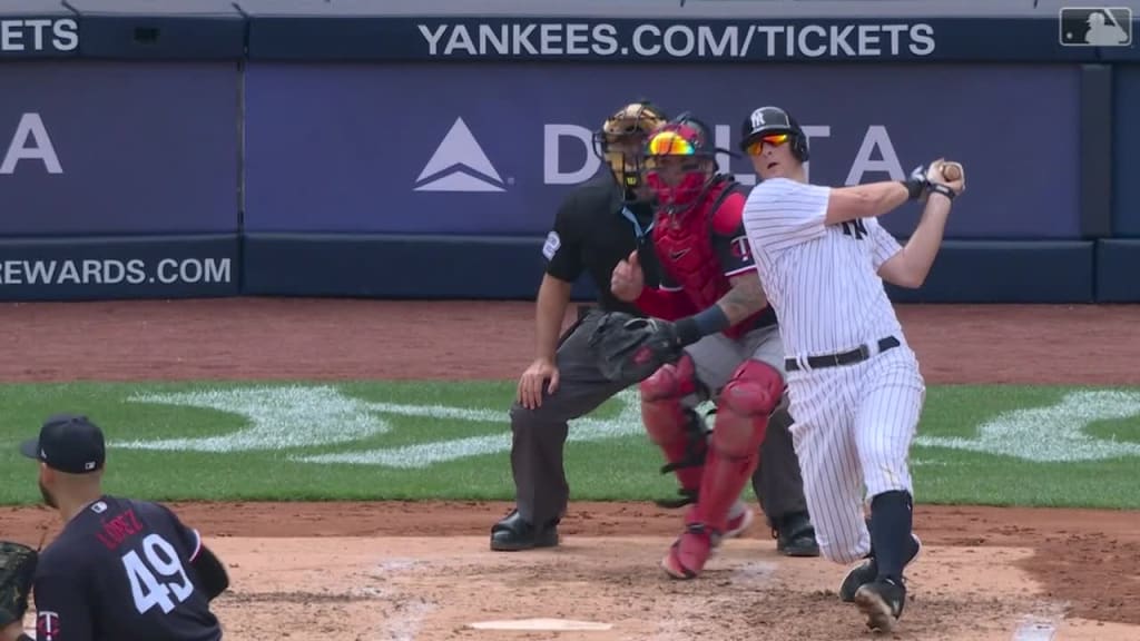 New York Yankees' DJ LeMahieu follows through on an RBI single