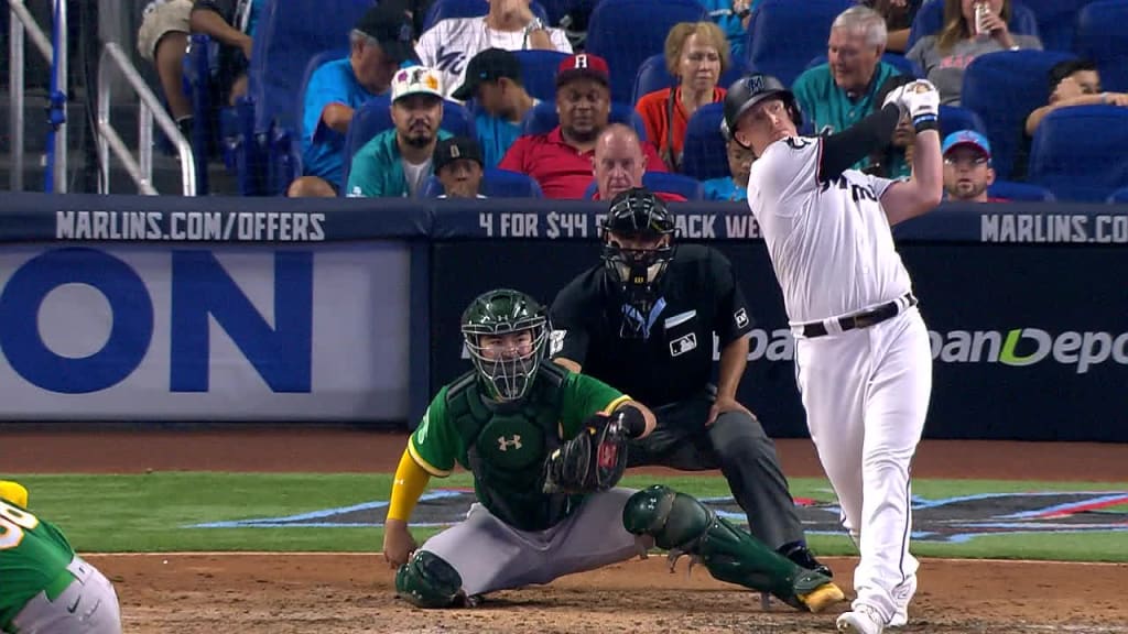 San Diego Padres' Garrett Cooper hits a home run during the sixth