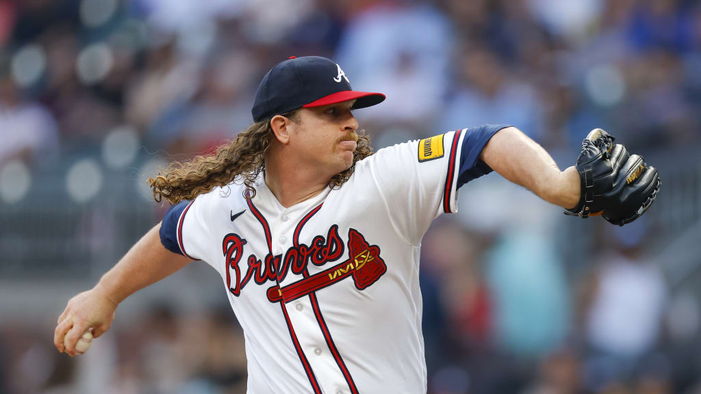 Grant Holmes strikes out three in four innings