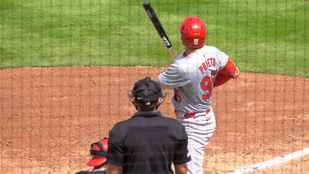 César Prieto grounds an RBI single to center field