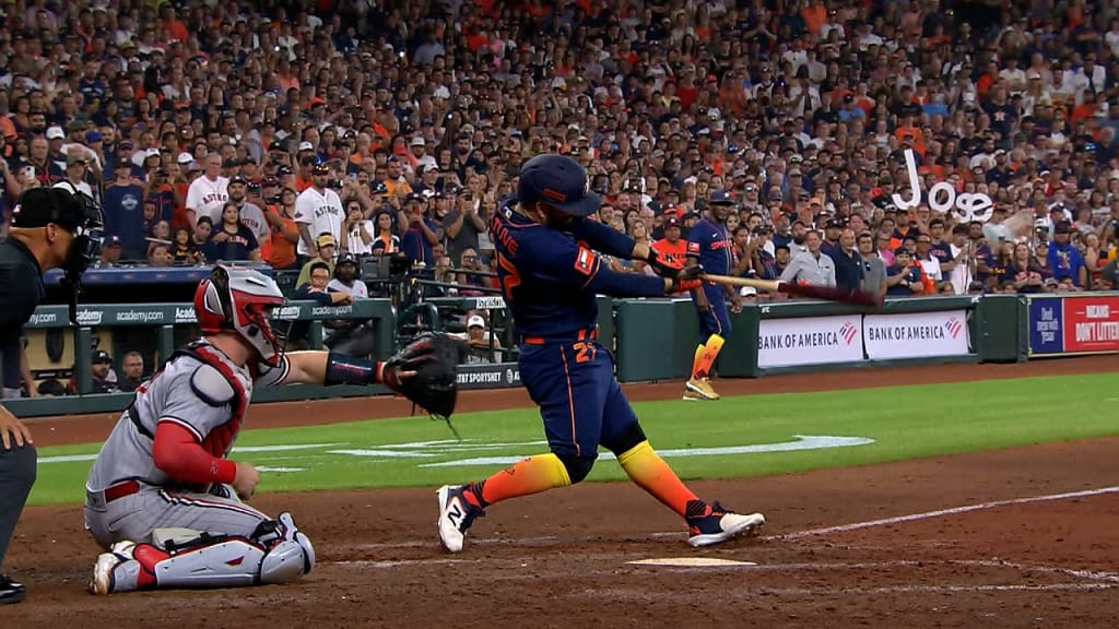 Jose Altuve of the Houston Astros hits a grand slam during the in 2023