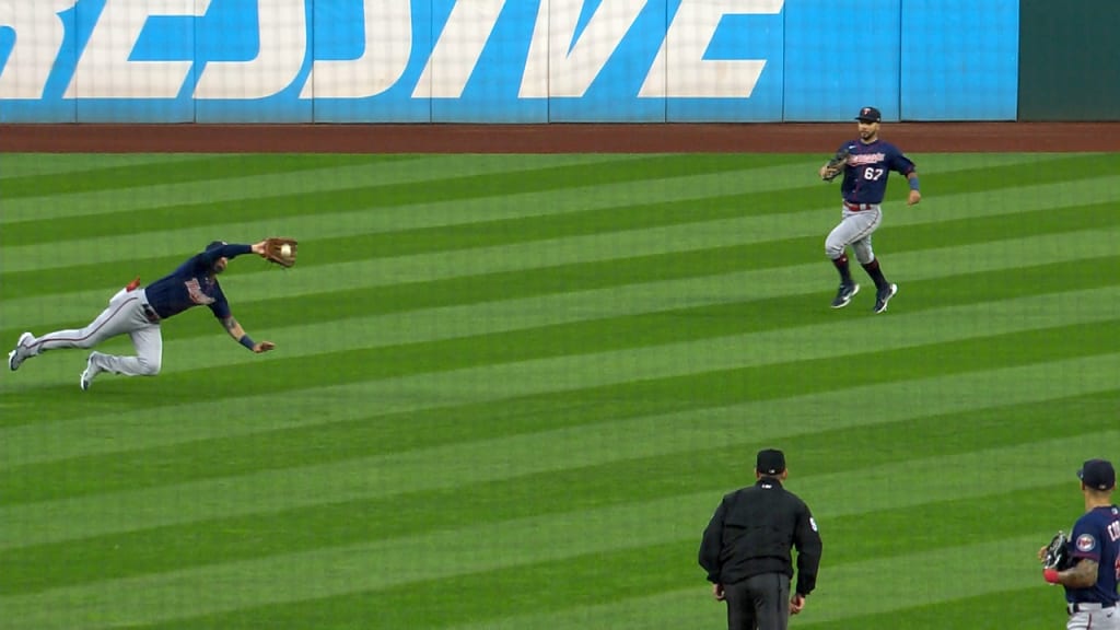 Jake Cave makes a sliding catch