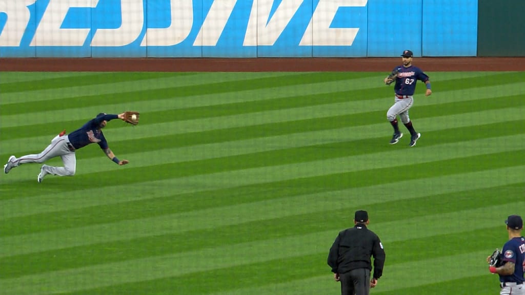 Center fielder Aaron Rowand makes a sliding catch on a ball hit by