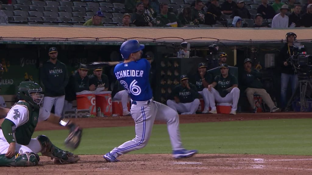 Toronto Blue Jays' Davis Schneider watches his RBI double off