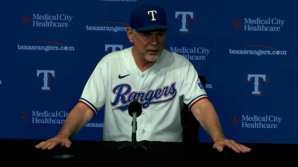 Rangers' Bruce Bochy reacts to another close play in loss to Astros