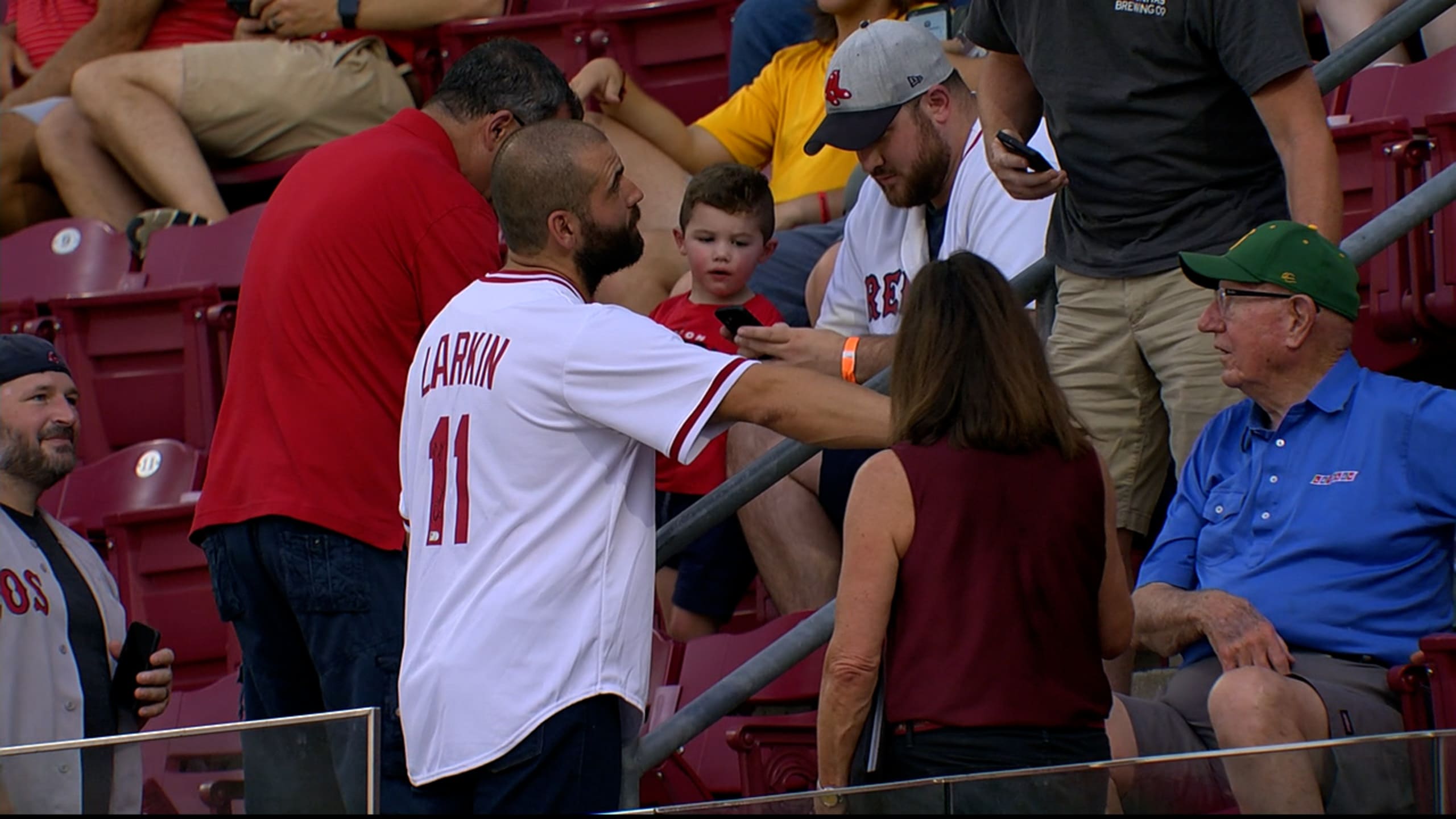 WATCH: Reds' Joey Votto wanders the crowd wearing Barry Larkin jersey,  greets fans during game vs. Red Sox 