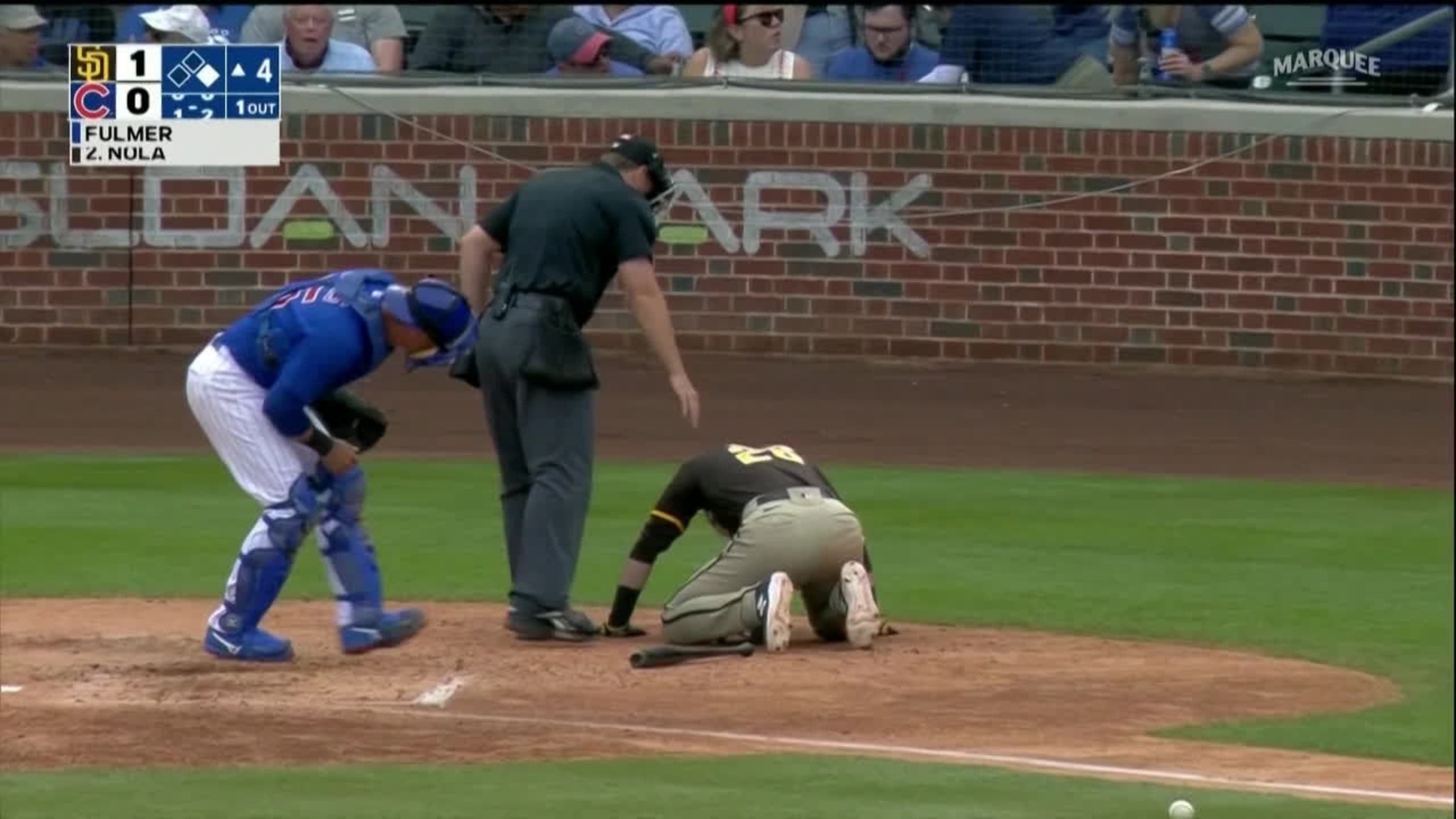 San Diego Padres catcher Austin Nola adjusts his helmet as he