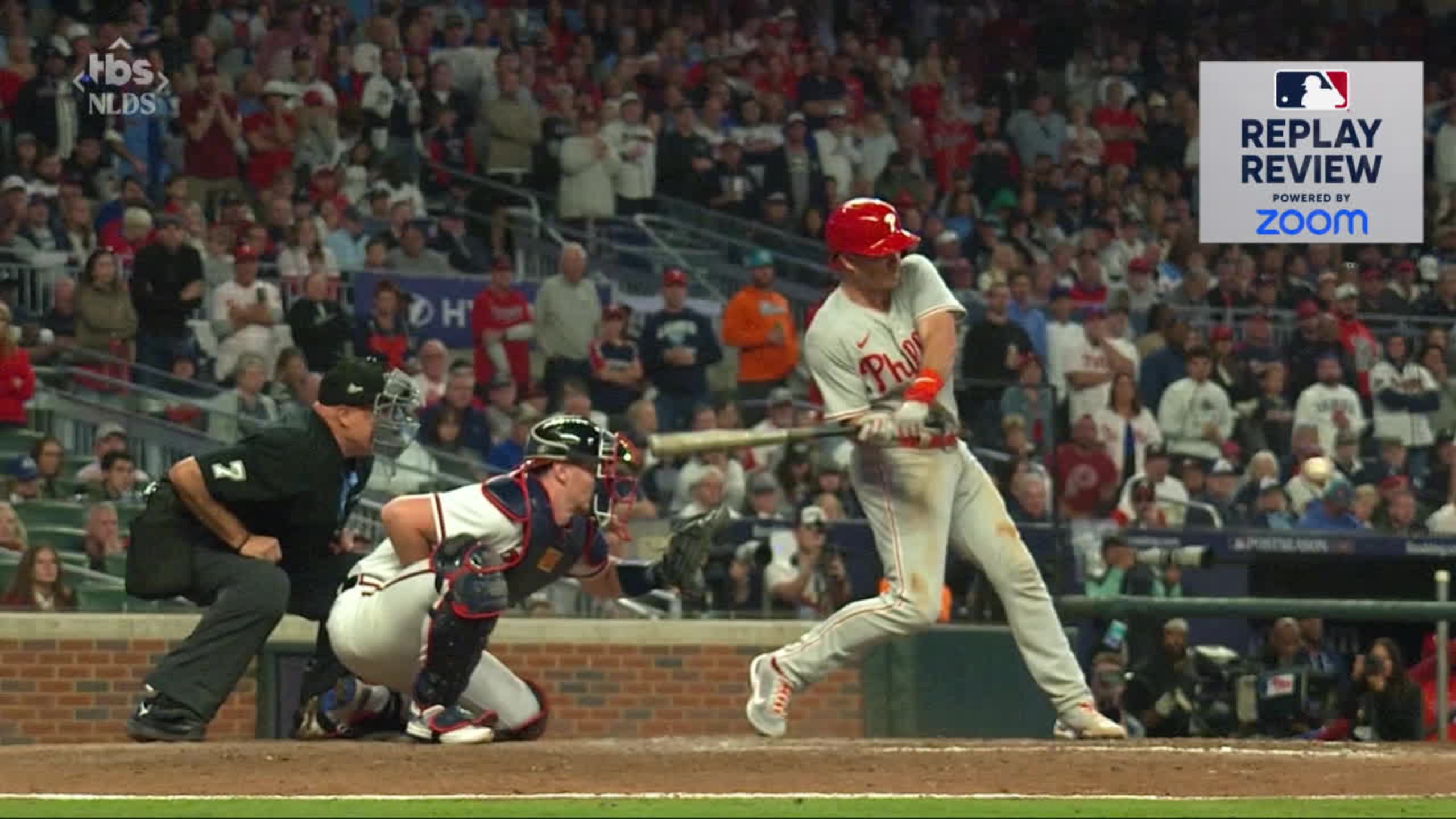 Braves fans throw cans on field after catcher interference call