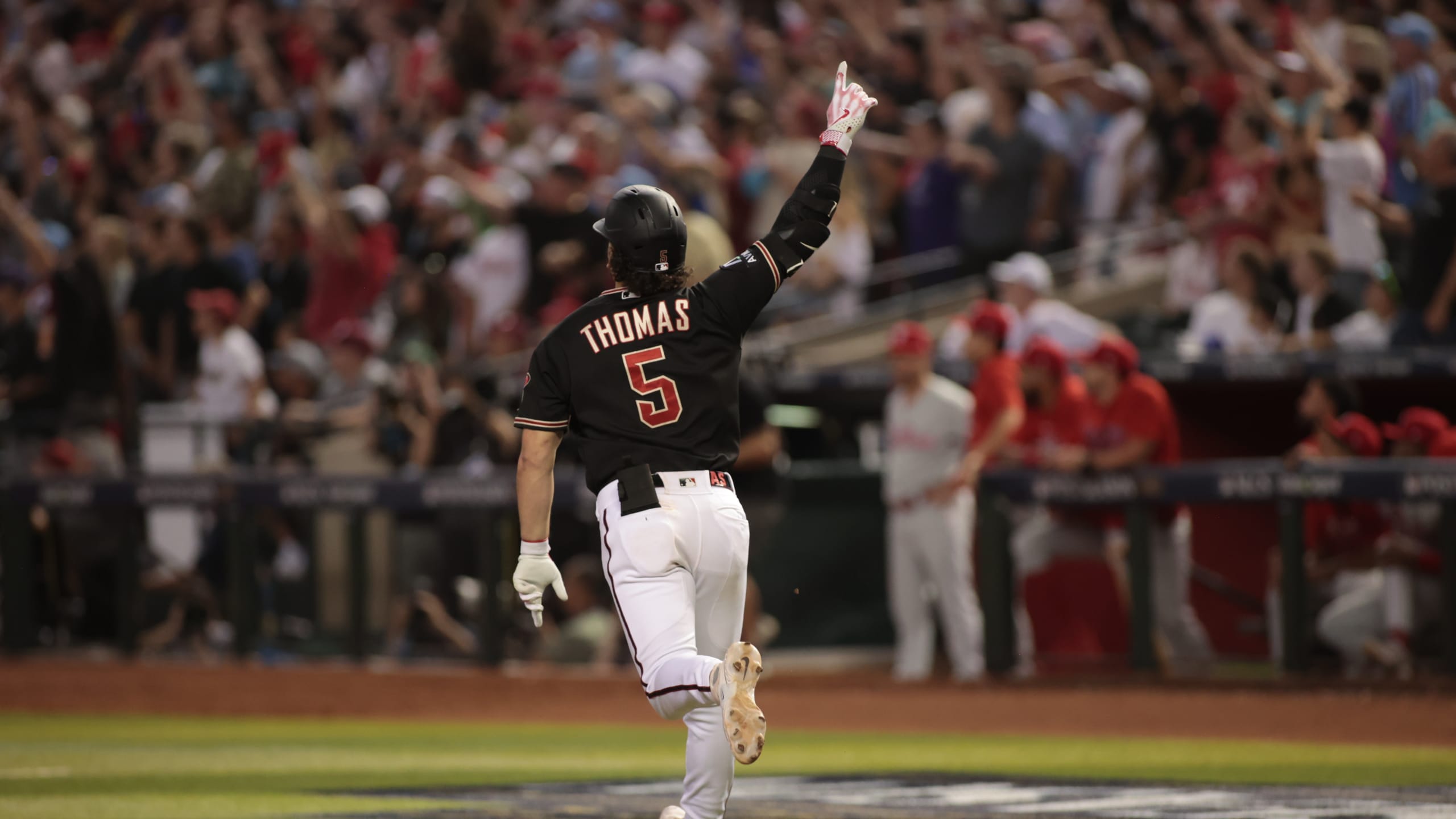 Alek Thomas of the Arizona Diamondbacks high fives Tommy Pham after News  Photo - Getty Images