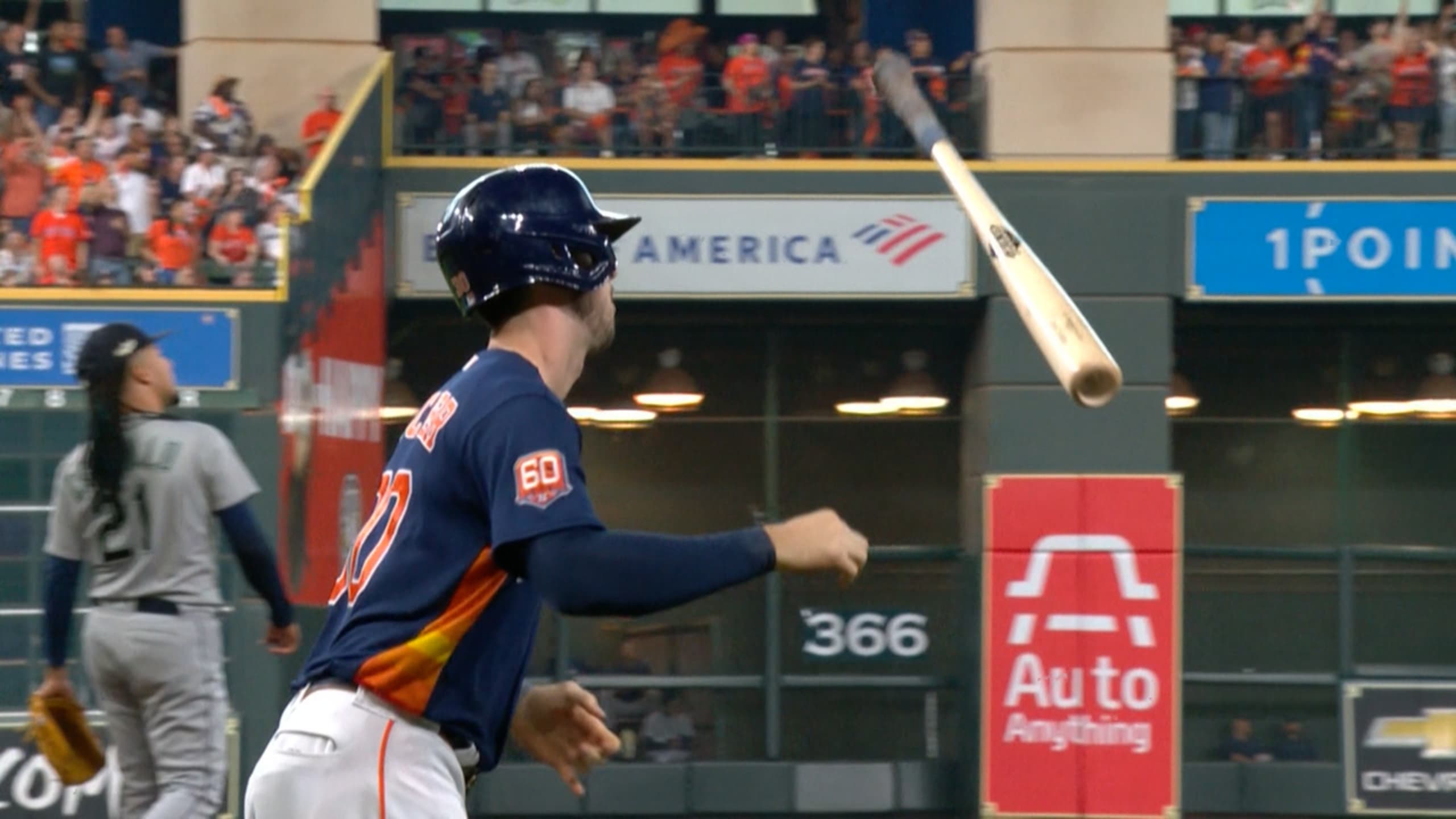 Houston Astros fans hold signs supporting second baseman Jose Altuve (27)  and designated hitter Yordan Alvarez before a baseball game between the  Seattle Mariners and the Astros, Friday, July 22, 2022, in