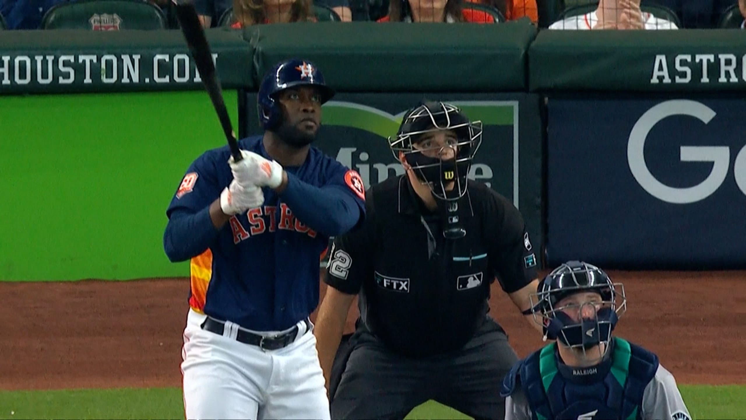 Houston Astros fans hold signs supporting second baseman Jose Altuve (27)  and designated hitter Yordan Alvarez before a baseball game between the  Seattle Mariners and the Astros, Friday, July 22, 2022, in