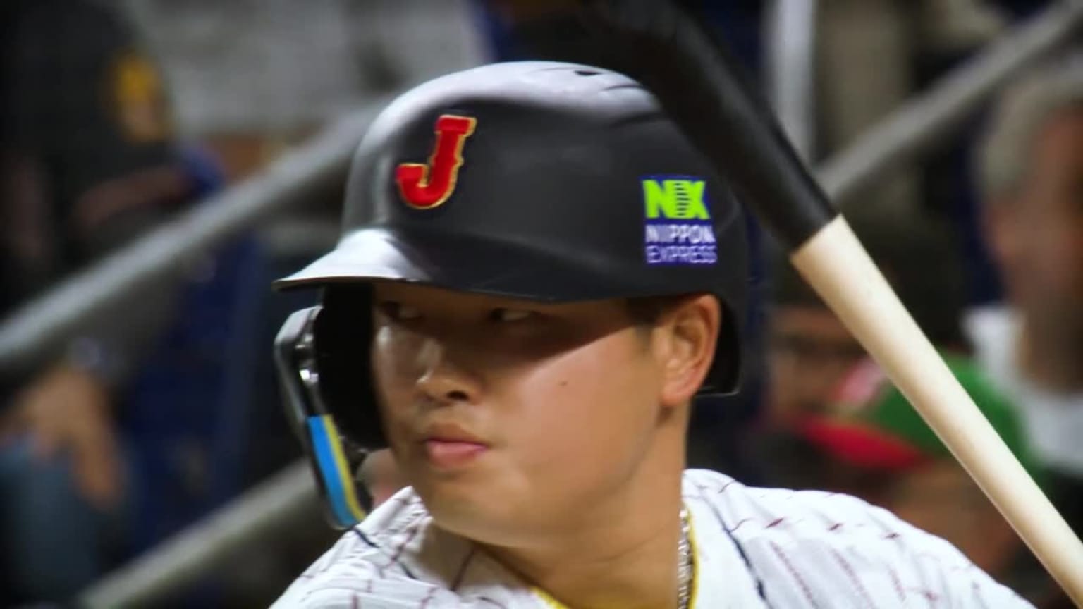 Munetaka Murakami of Team Japan reacts to hitting a walk off two