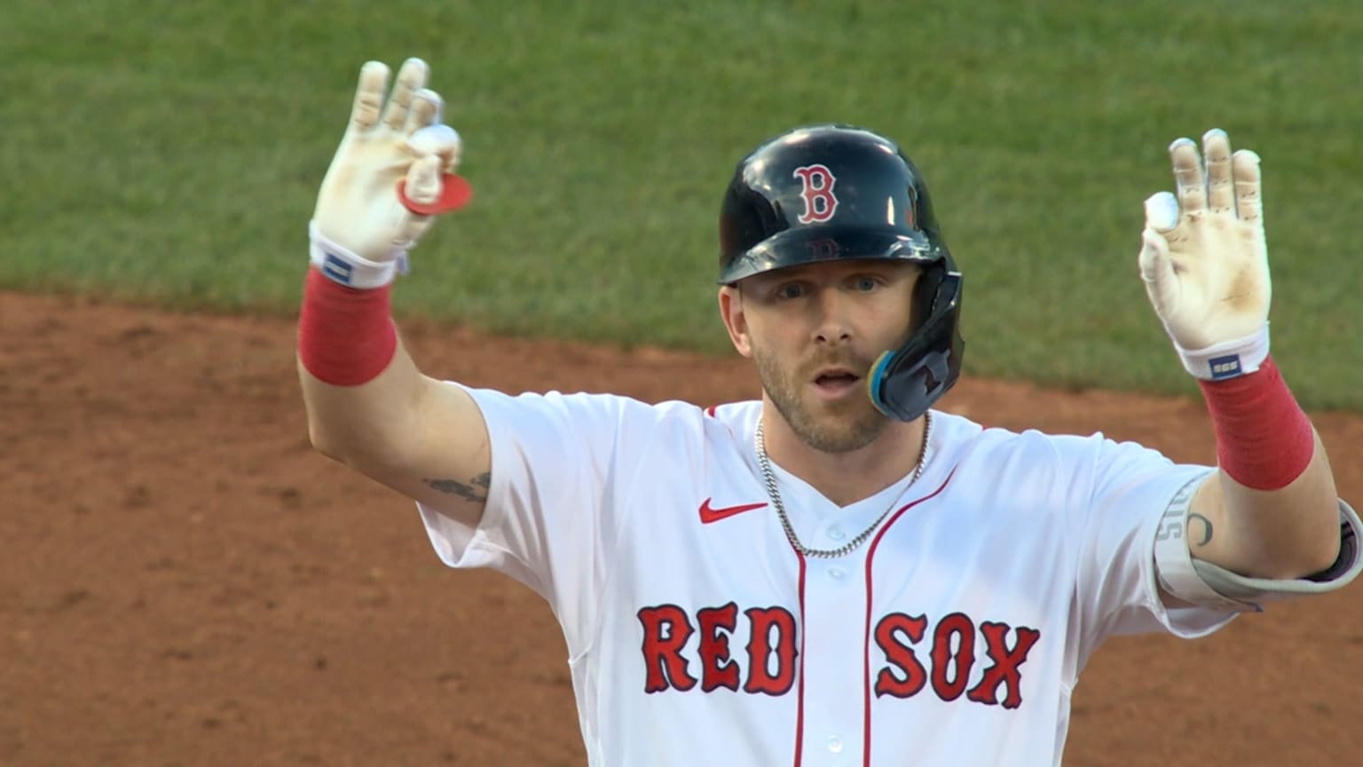 Trevor Story of the Boston Red Sox reacts after hitting an RBI