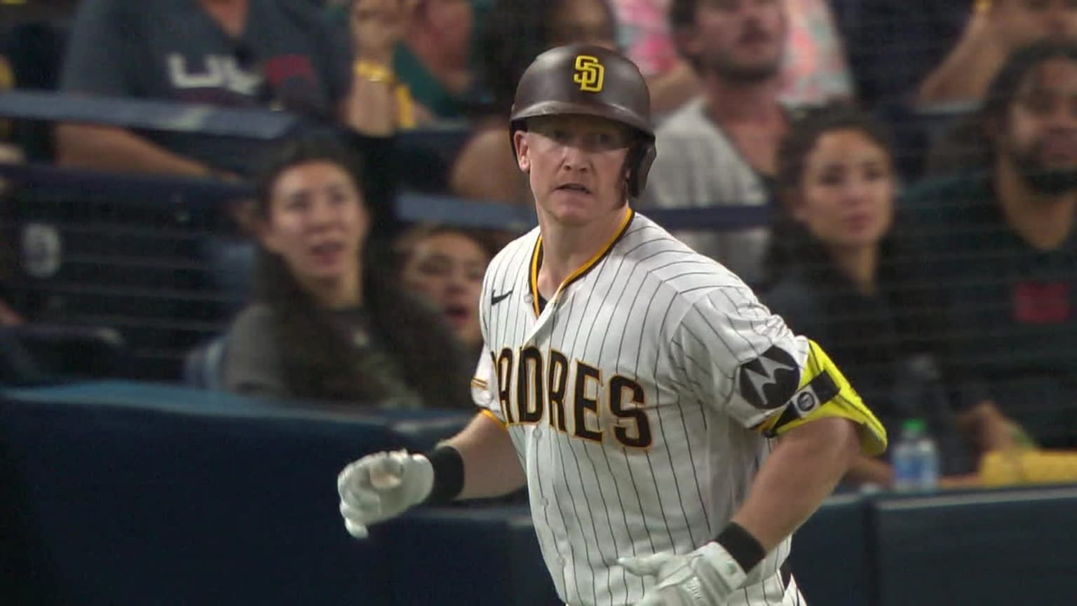 Garrett Cooper of the San Diego Padres stands on the field during