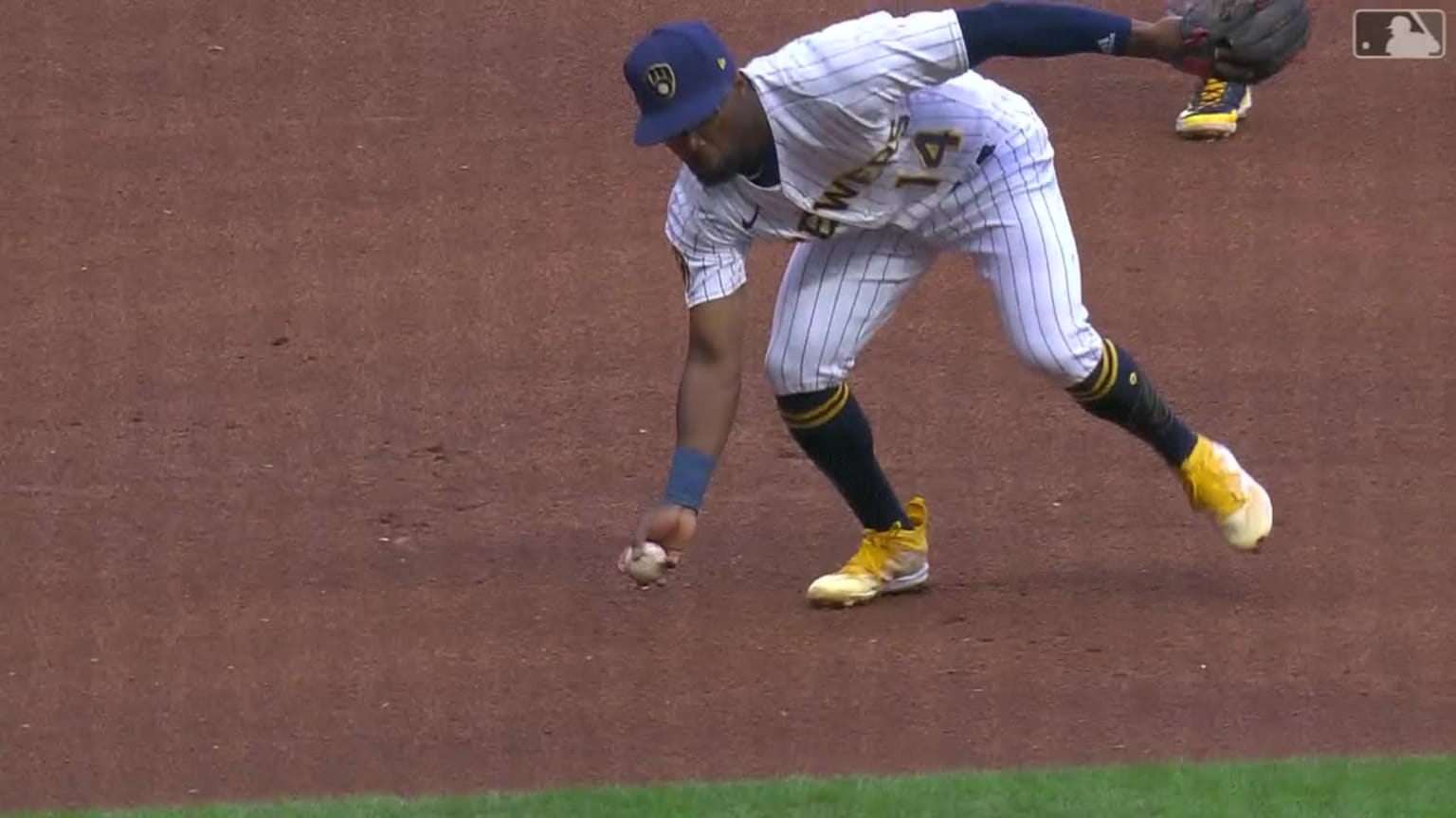 Milwaukee Brewers' Andruw Monasterio (14) fields a ground ball out off the  bat of Pittsburgh Pirates' Andrew McCutchen during the fourth inning of a  baseball game Saturday, Aug 5, 2023, in Milwaukee.