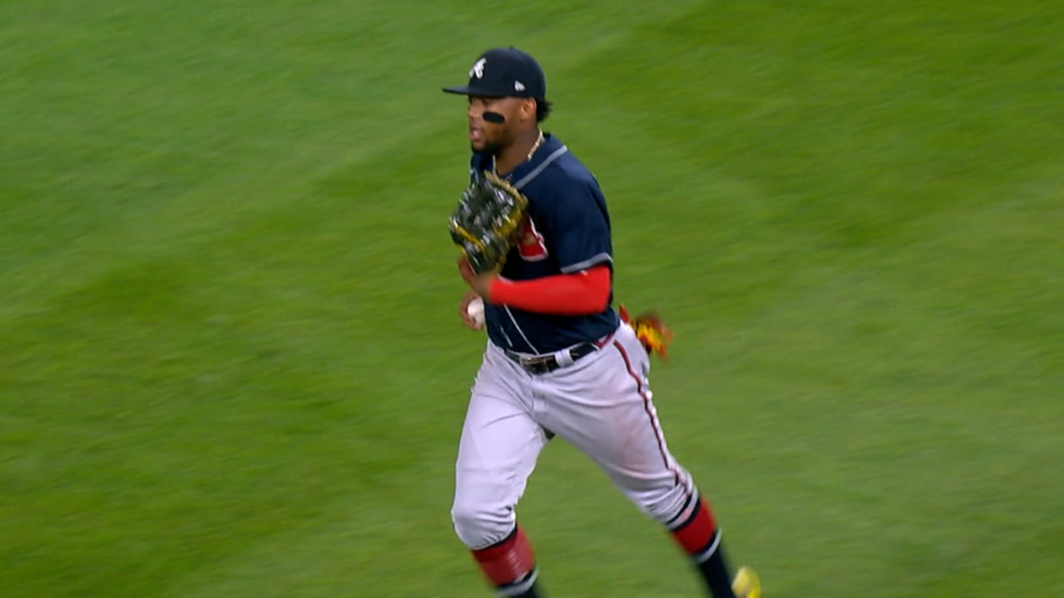 Atlanta Braves' Ronald Acuna Jr. puts on his Nike batting gloves in the  dugout during a baseball game against the Cincinnati Reds in Cincinnati,  Friday, July 1, 2022. The Braves won 9-1. (