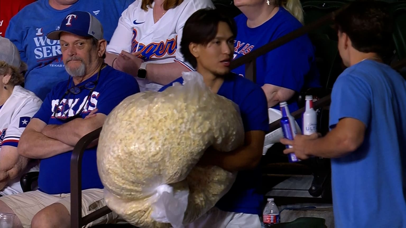 HUGE bag of popcorn coexists with Rangers fan at game | 05/13/2026 ...