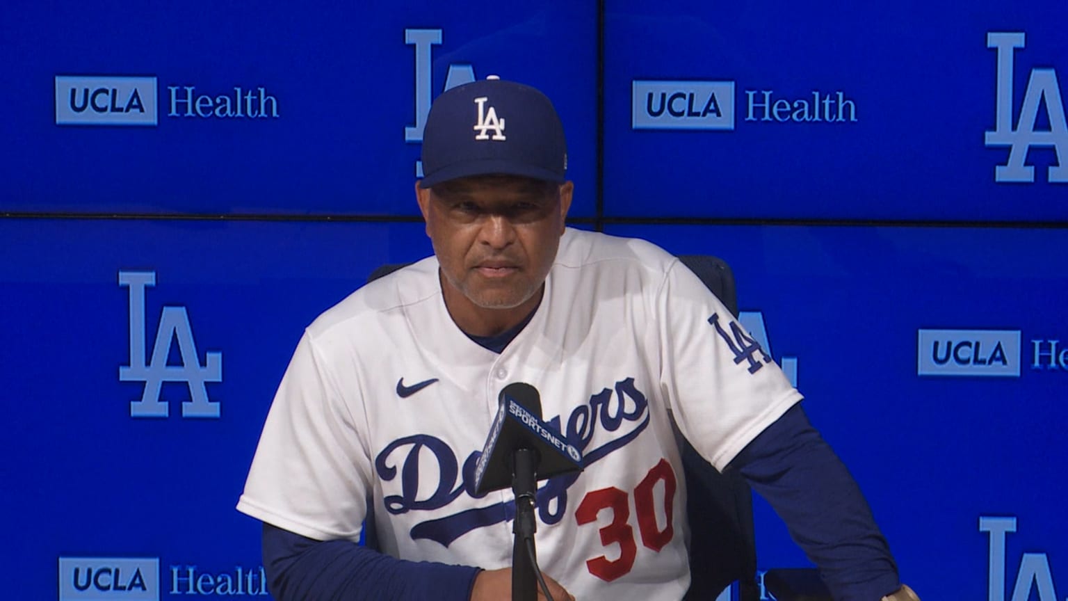 Los Angeles Dodgers manager Dave Roberts reacts as Kansas City