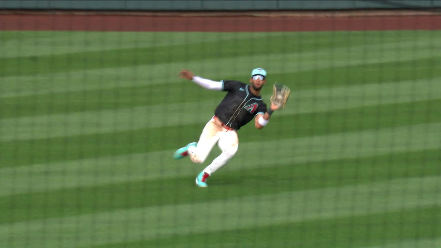 Lourdes Gurriel Jr makes a sliding catch 02/24/2024 Arizona