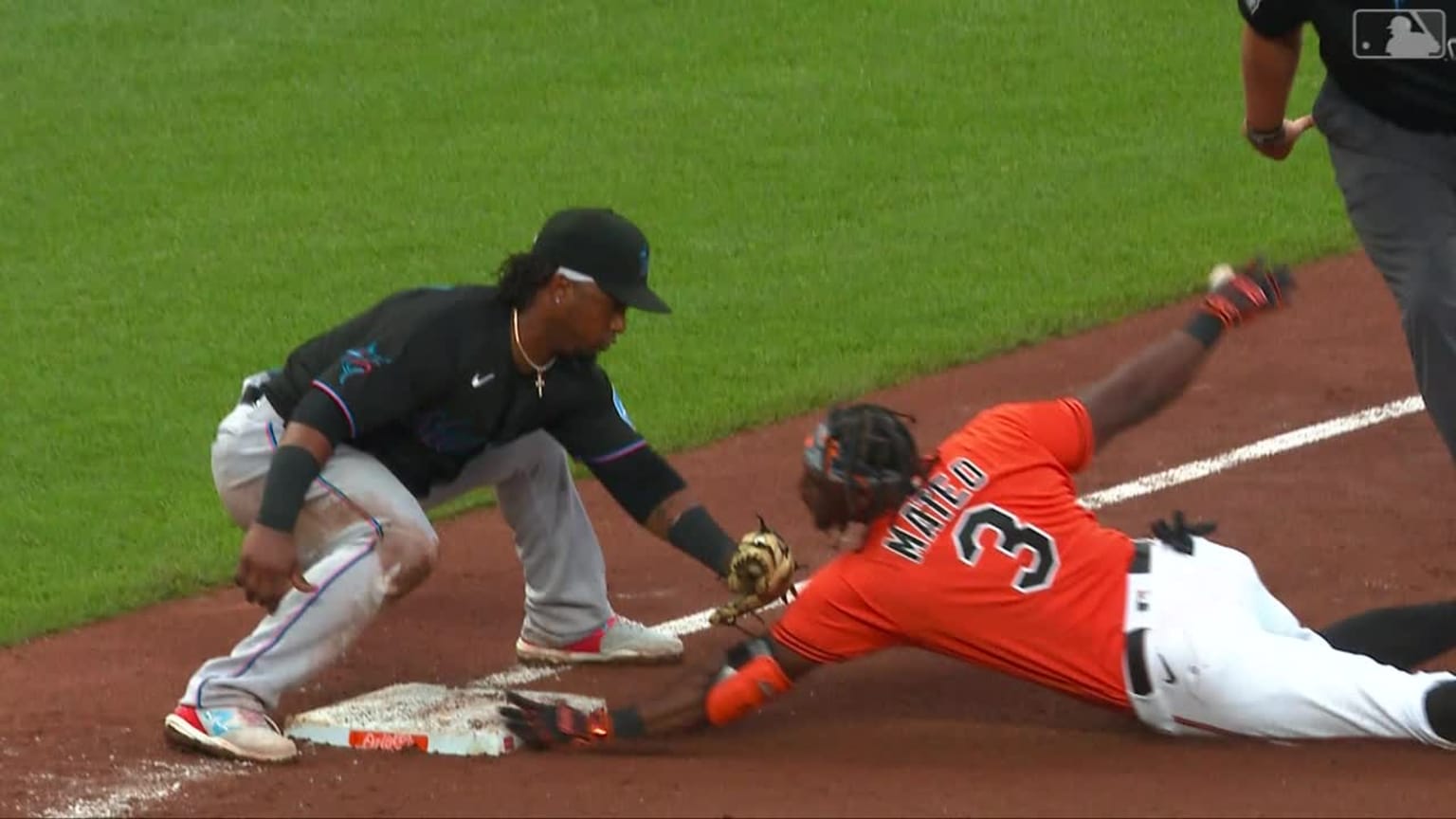 Baltimore Orioles' Jorge Mateo slides safely into home to score