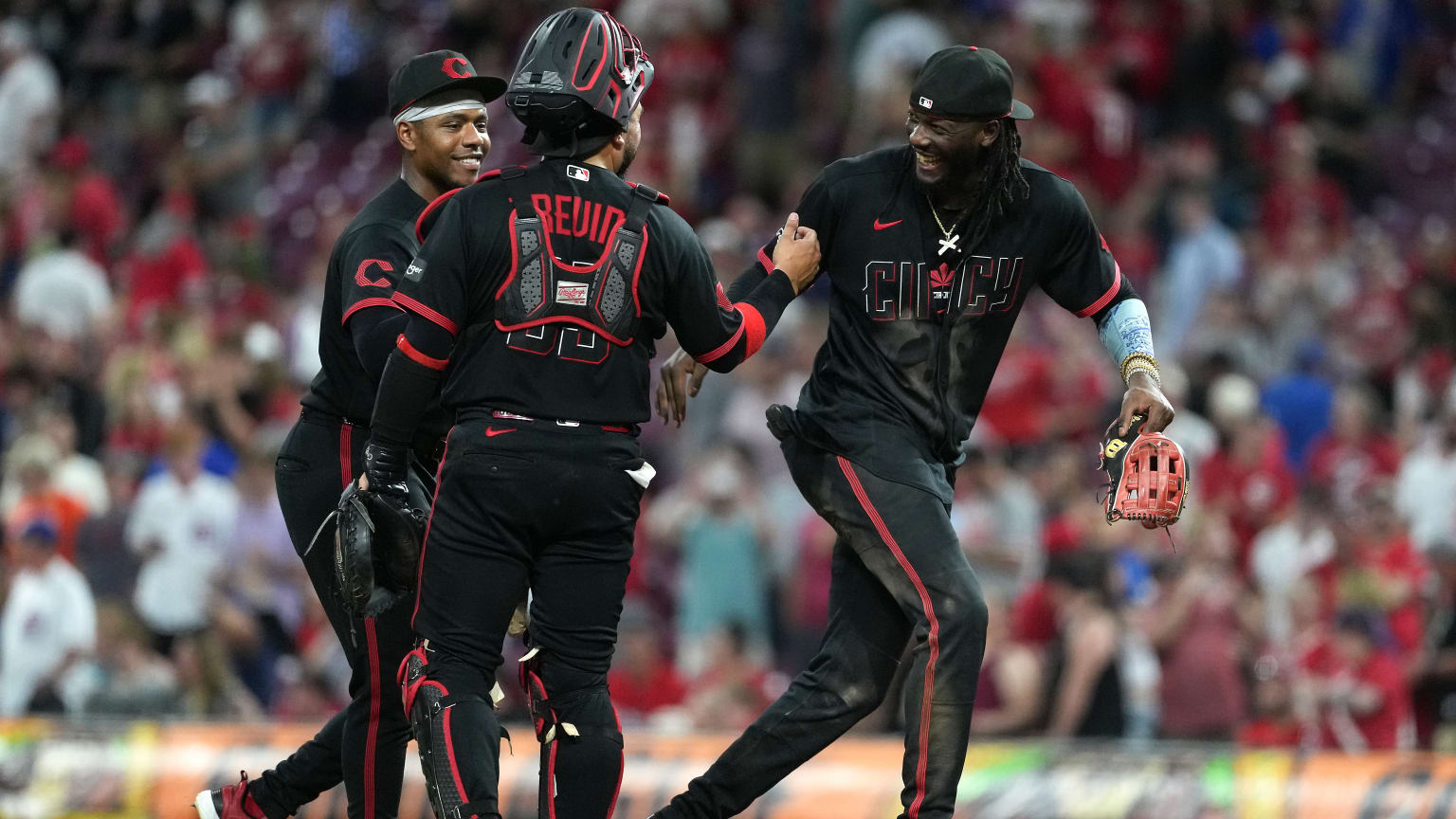 Jose Trevino throws out Michael Busch at second base to secure the Reds' 6-4 win after a review overturned the call on the field in the 9th