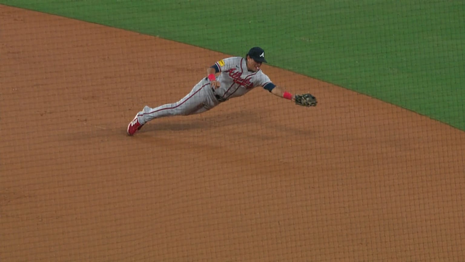 Nicky Lopez dives and starts a 6-4-3 double play for Italy vs