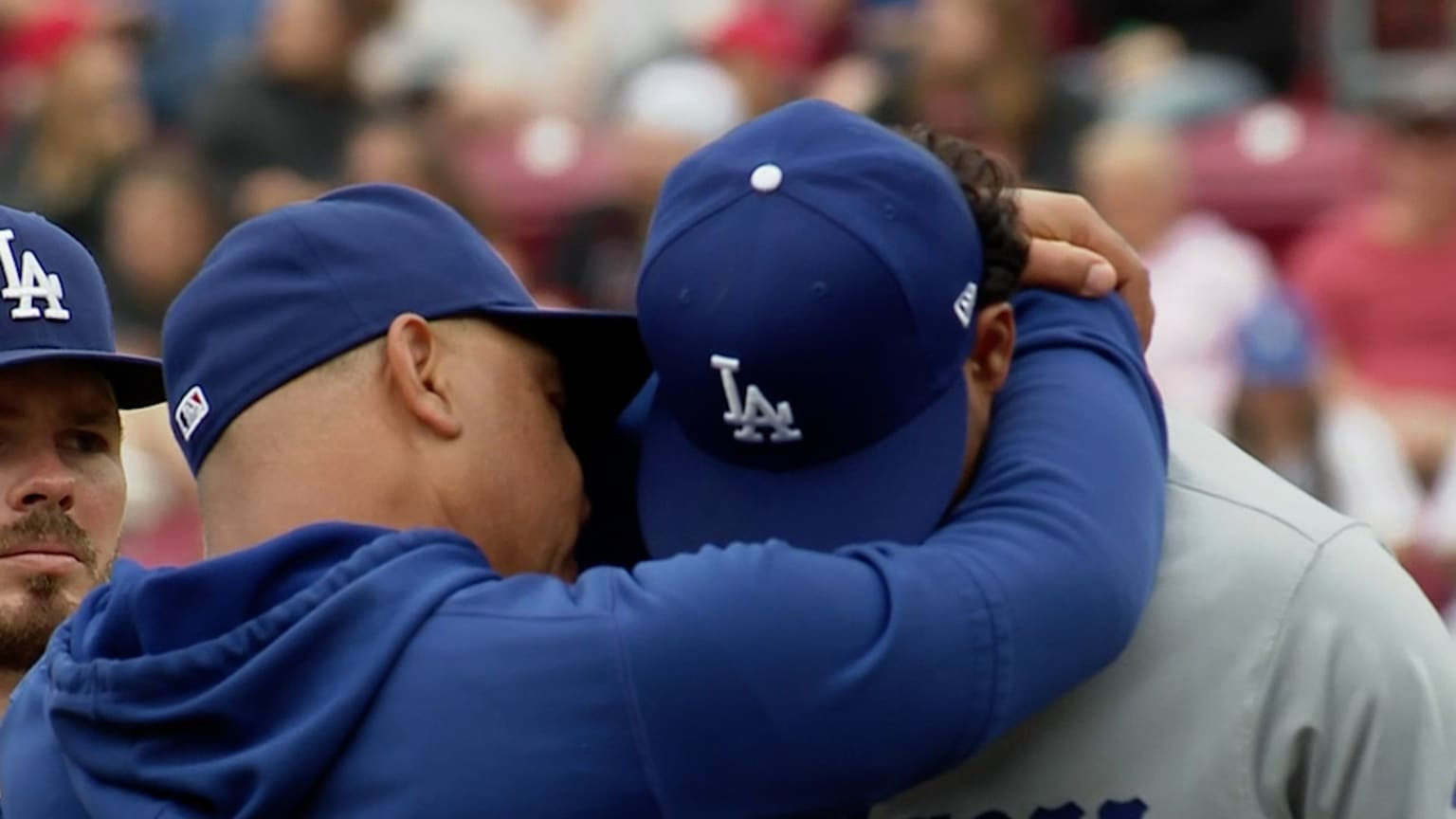 Dave Roberts hugs Yohan Ramírez after hit-by-pitch