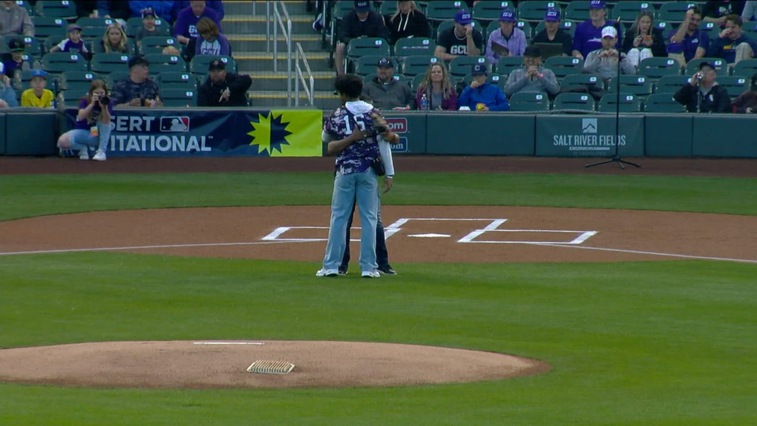 Homer Bush Jr. throws to his father, Homer Bush Sr. 02/18/2024