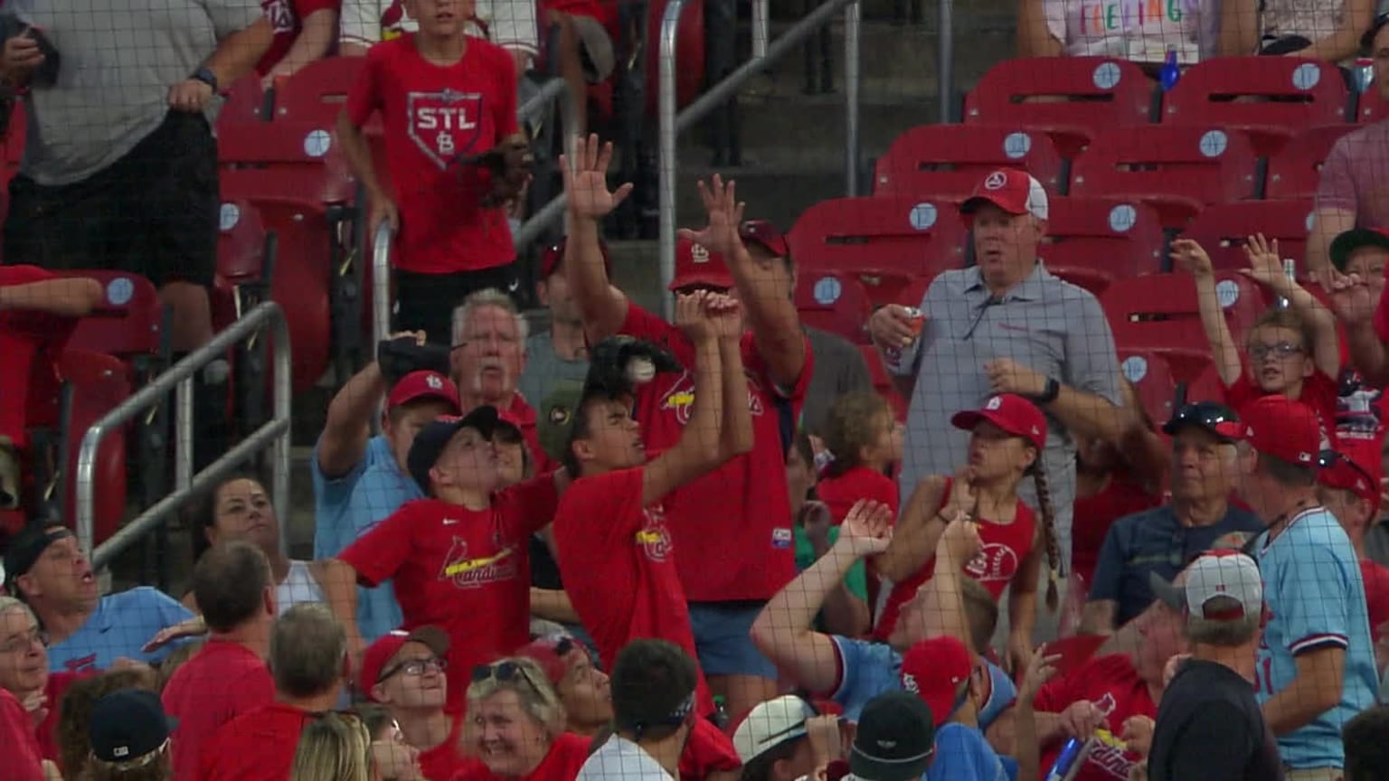 A young Cardinals fan saves fellow fan from foul ball 06/29/2023 St