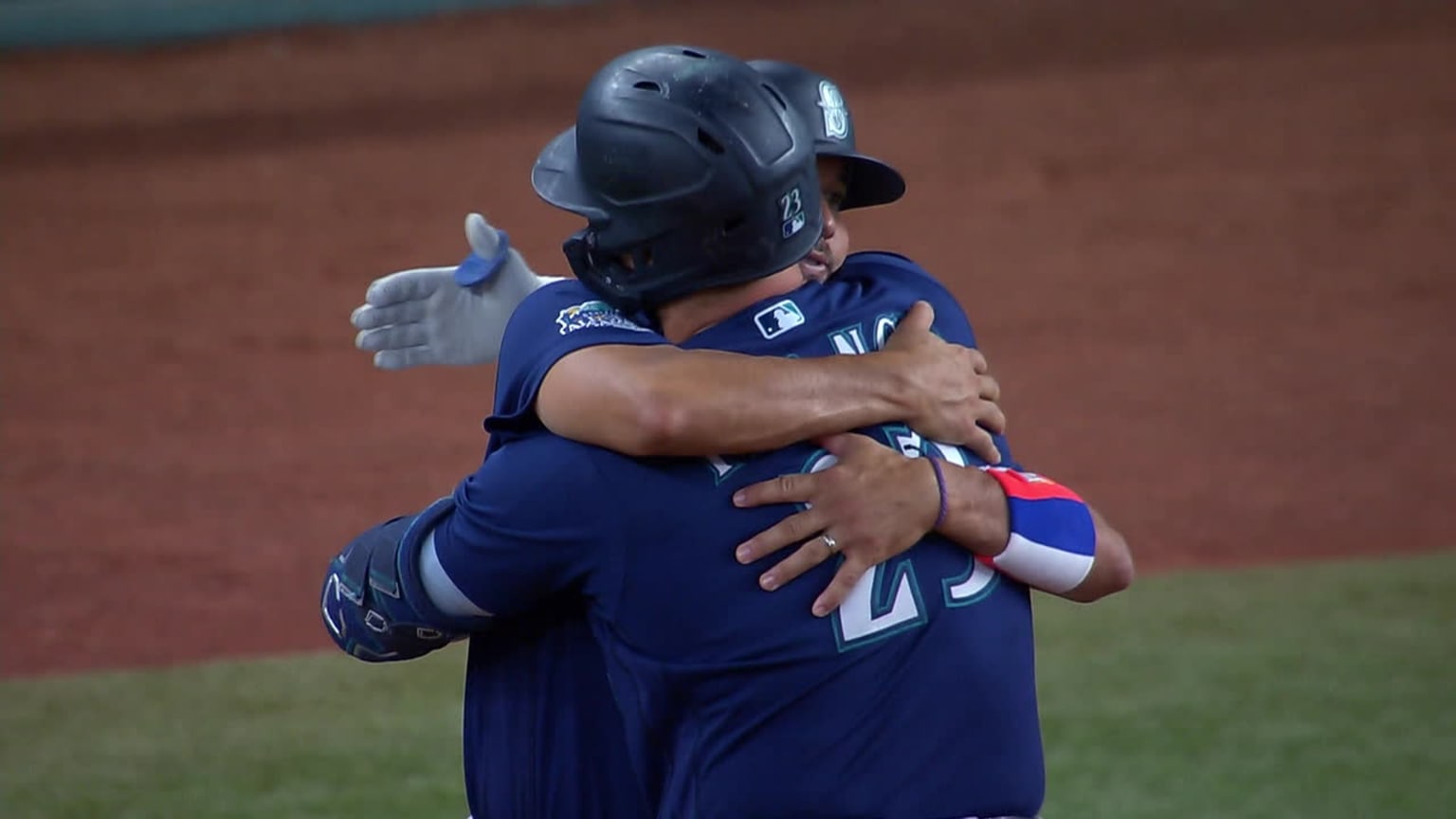 Ty France singles and shares hug with a coach | 09/23/2023 | Seattle ...